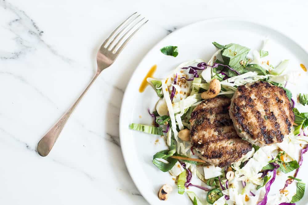 Thai-style chicken burger with Asian salad