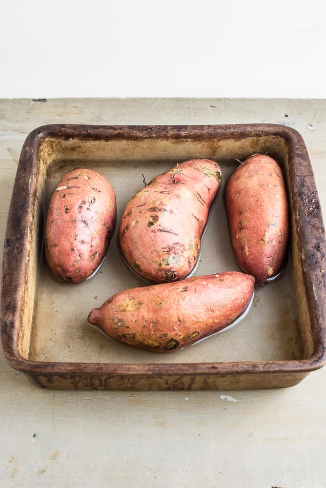 Sweet Potatoes in pan with water