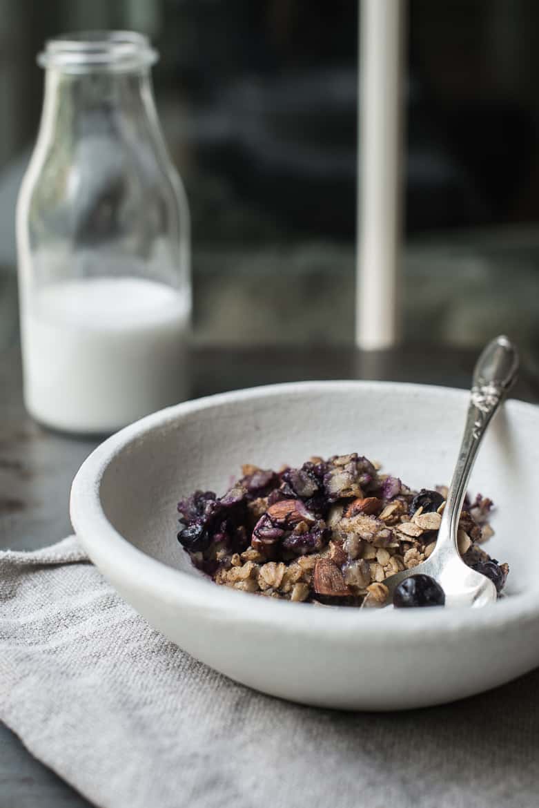 Milk bottle and Baked Berry Oatmeal in bowl
