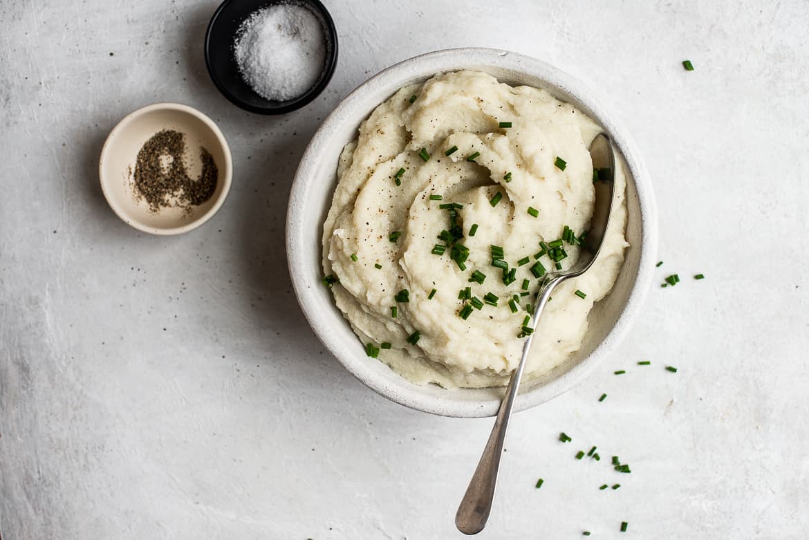 Creamy Cauliflower Puree in a bowl with chives
