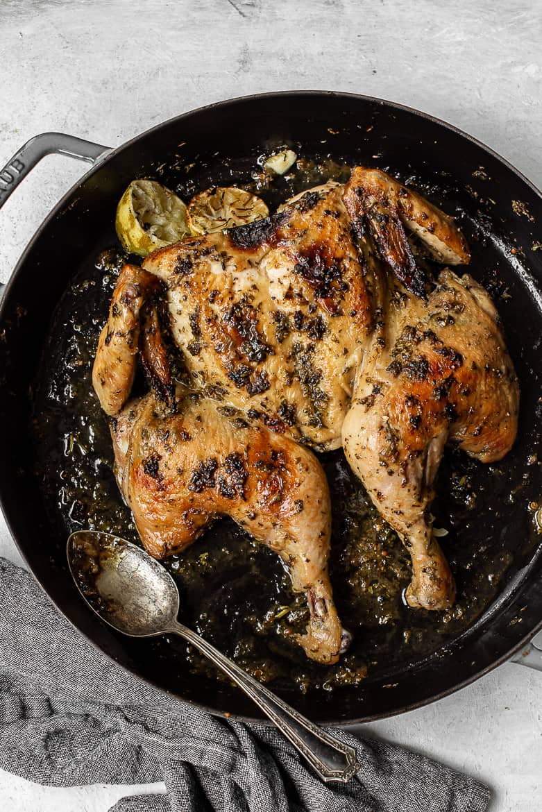 Spatchcocked Chicken with Cilantro and Lime on skillet