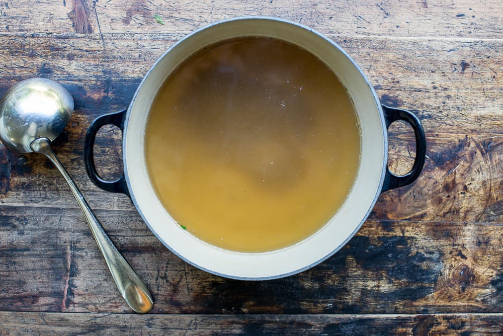 chicken broth in pot 