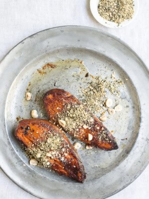 Roasted sweet potatoes with crushed pepitas and hazelnuts