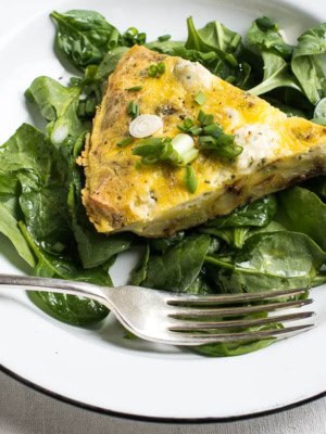 Boursin Potato Frittata sliced with spinach