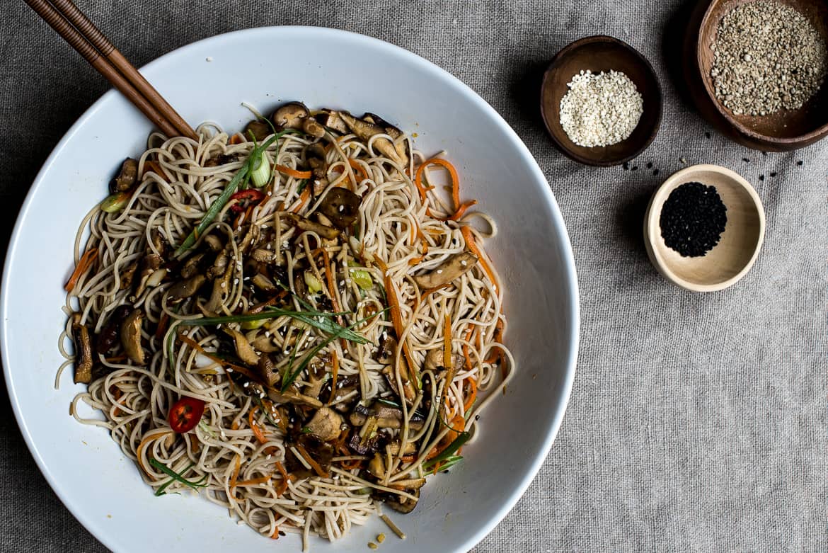 Stir-fried soba noodles in large serving bowl