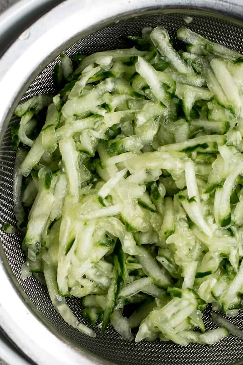 straining cucumbers for Tzatziki