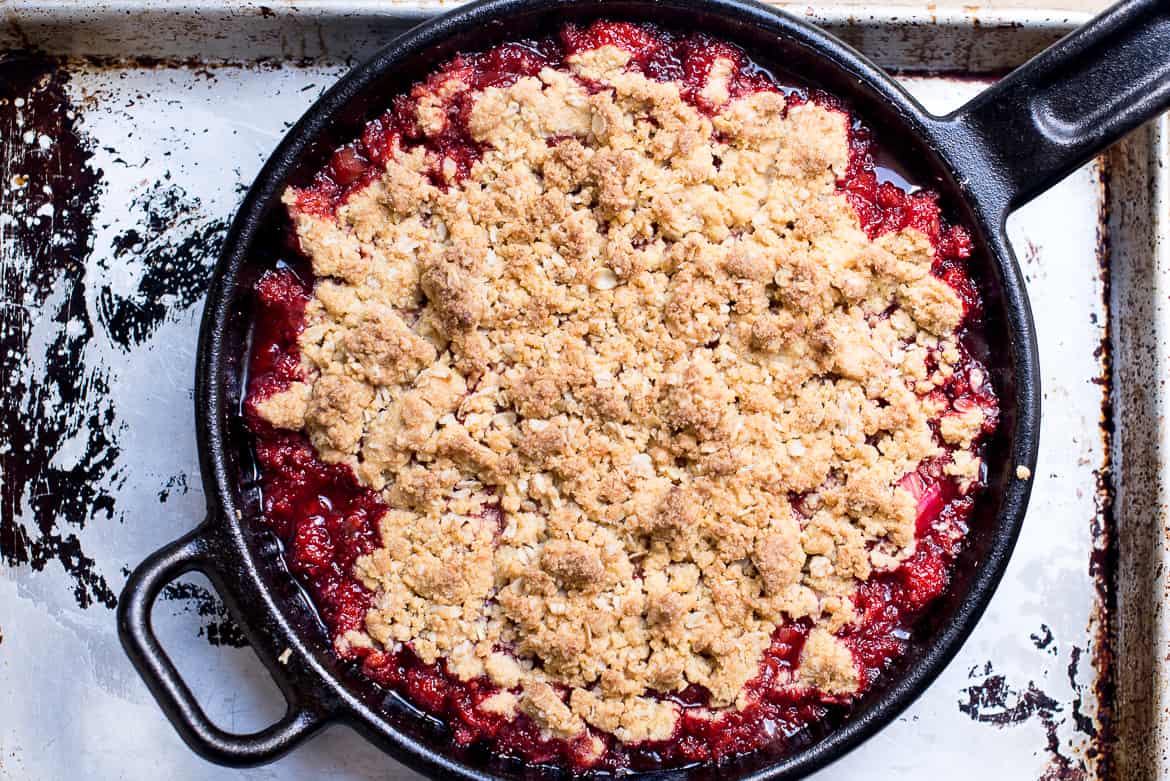 Strawberry- Rhubarb polenta crisp in skillet