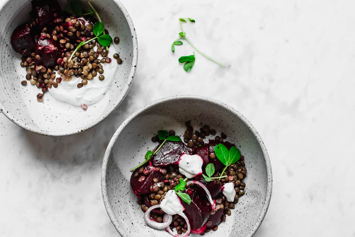 two bowls with beets and lentils