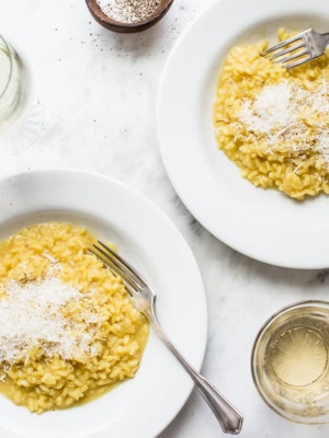 Risotto Milanese in two bowls