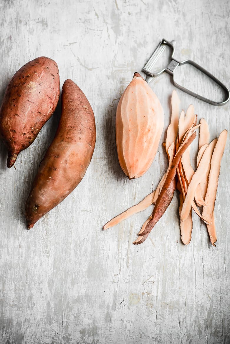 peeling sweet potatoes