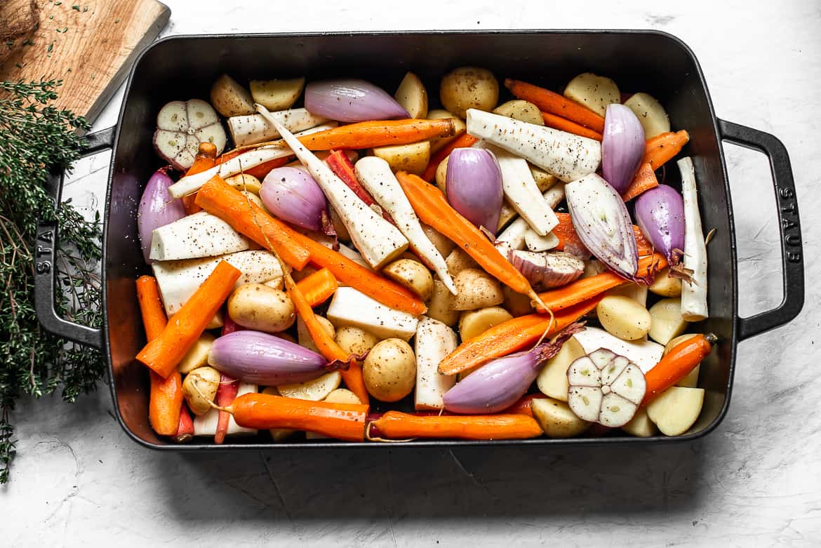 Root vegetables in roasting pan