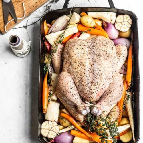 Chicken on top of root vegetables