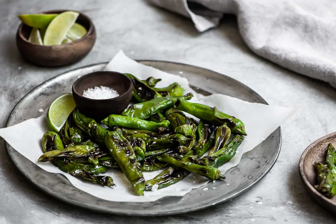 Shishito peppers with flaky salt and limes