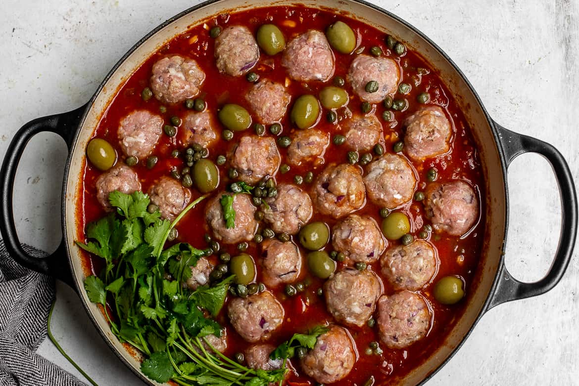 Meatballs in sauce before braising