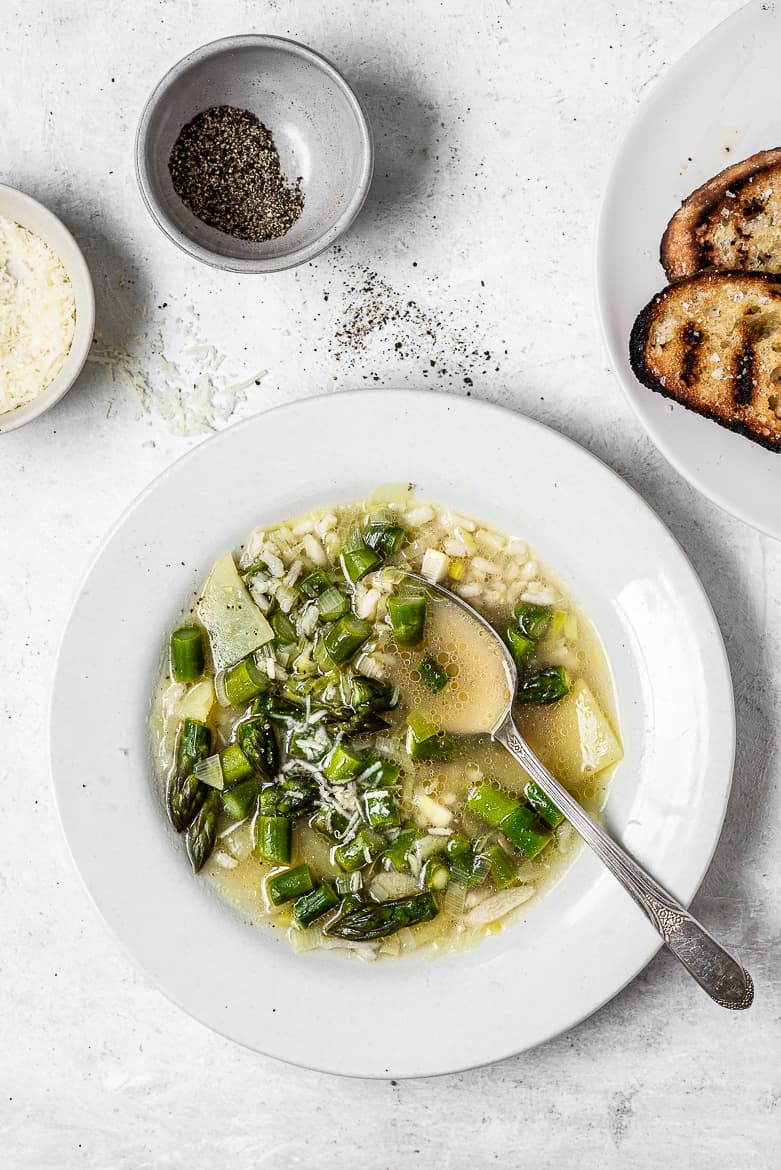 Asparagus and rice soup in bowl