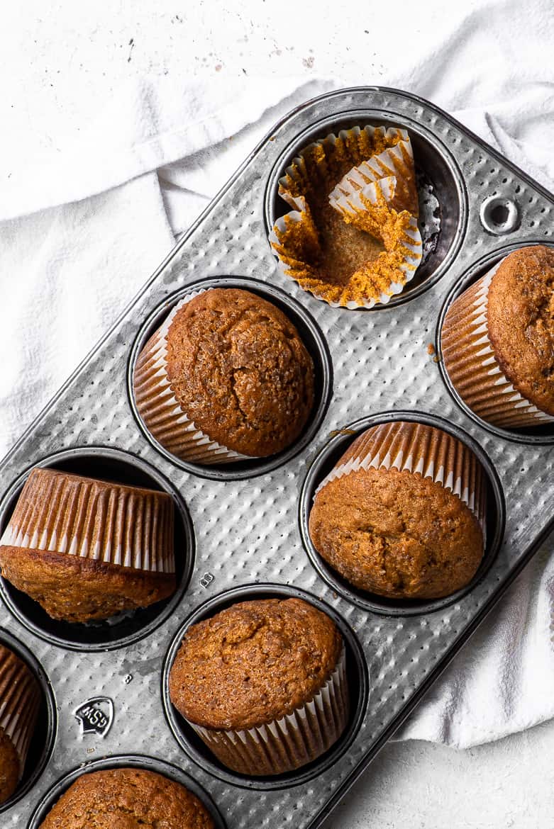 baked pumpkin muffins in muffin tray