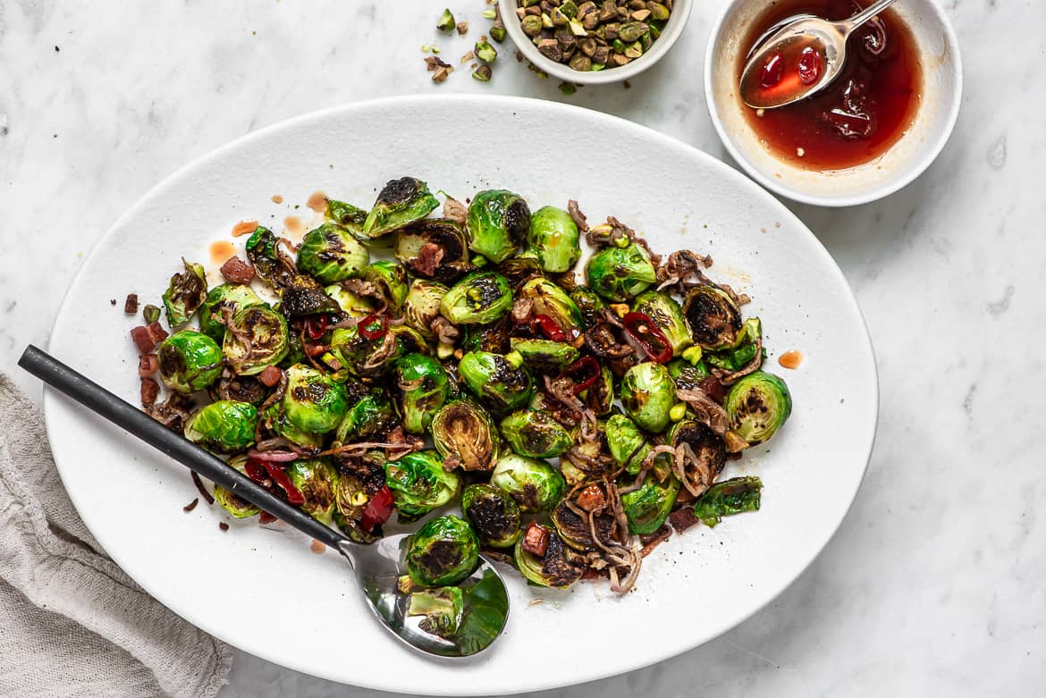 Brussels sprouts with agrodolce sauce on platter