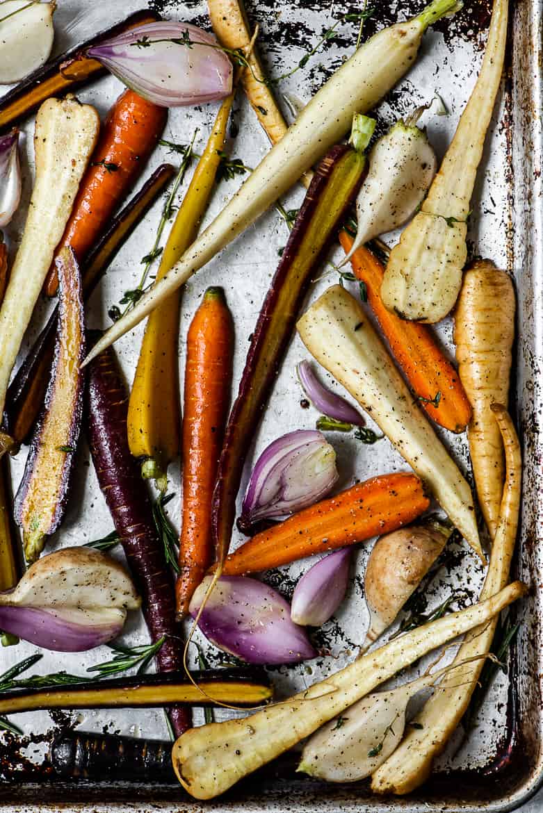 Prepped root vegetables on baking sheet 