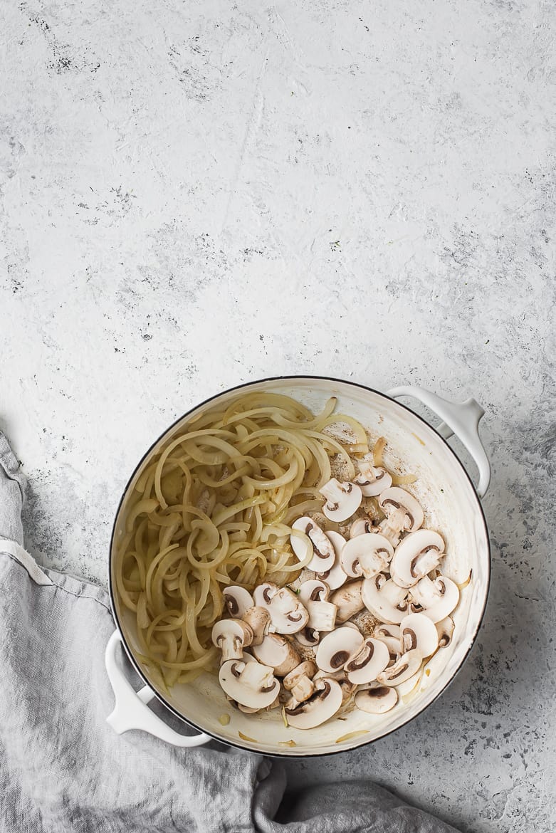 onions and mushrooms in pot 