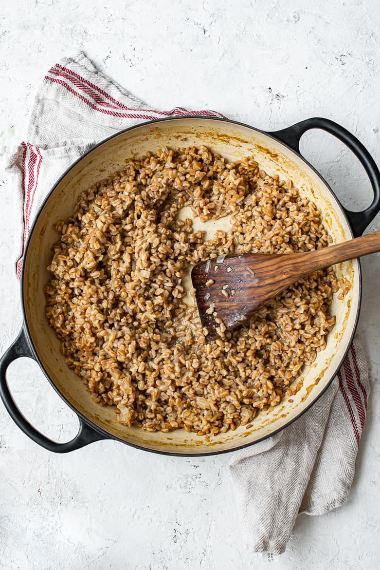 Farrotto cooking in pan