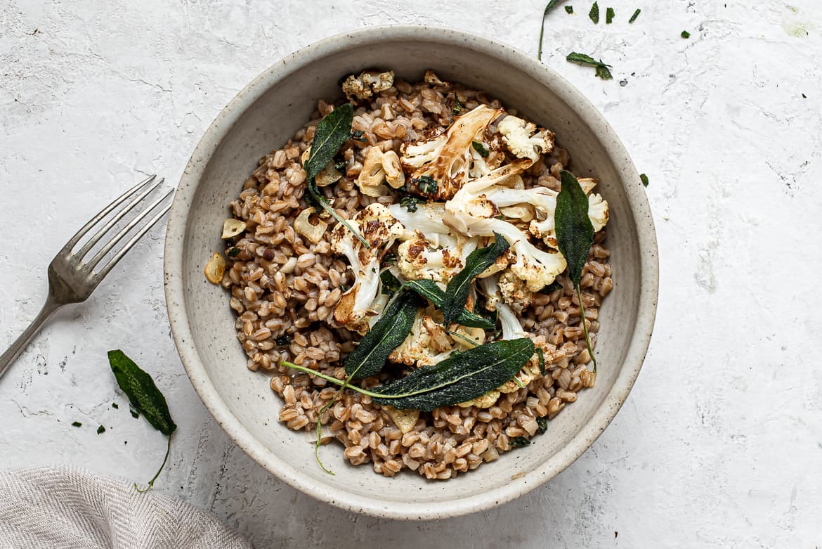 Farro risotto in bowl with cauliflower