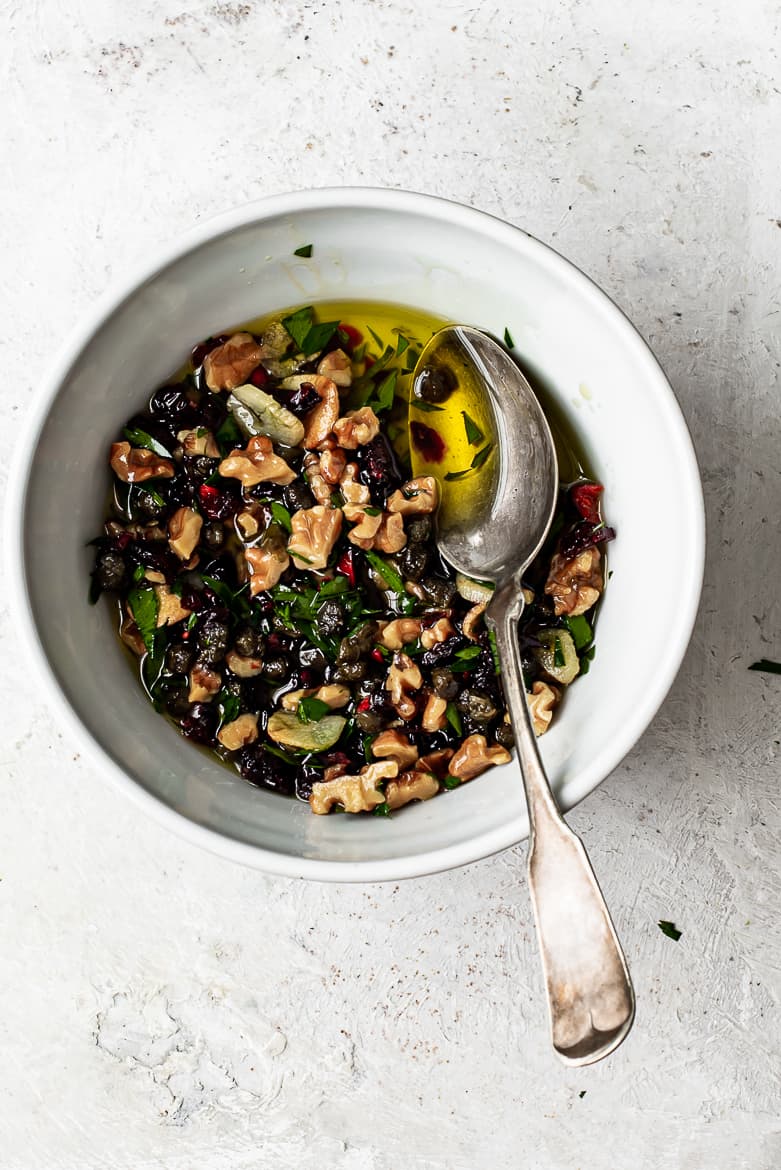 Walnut-caper salsa in bowl