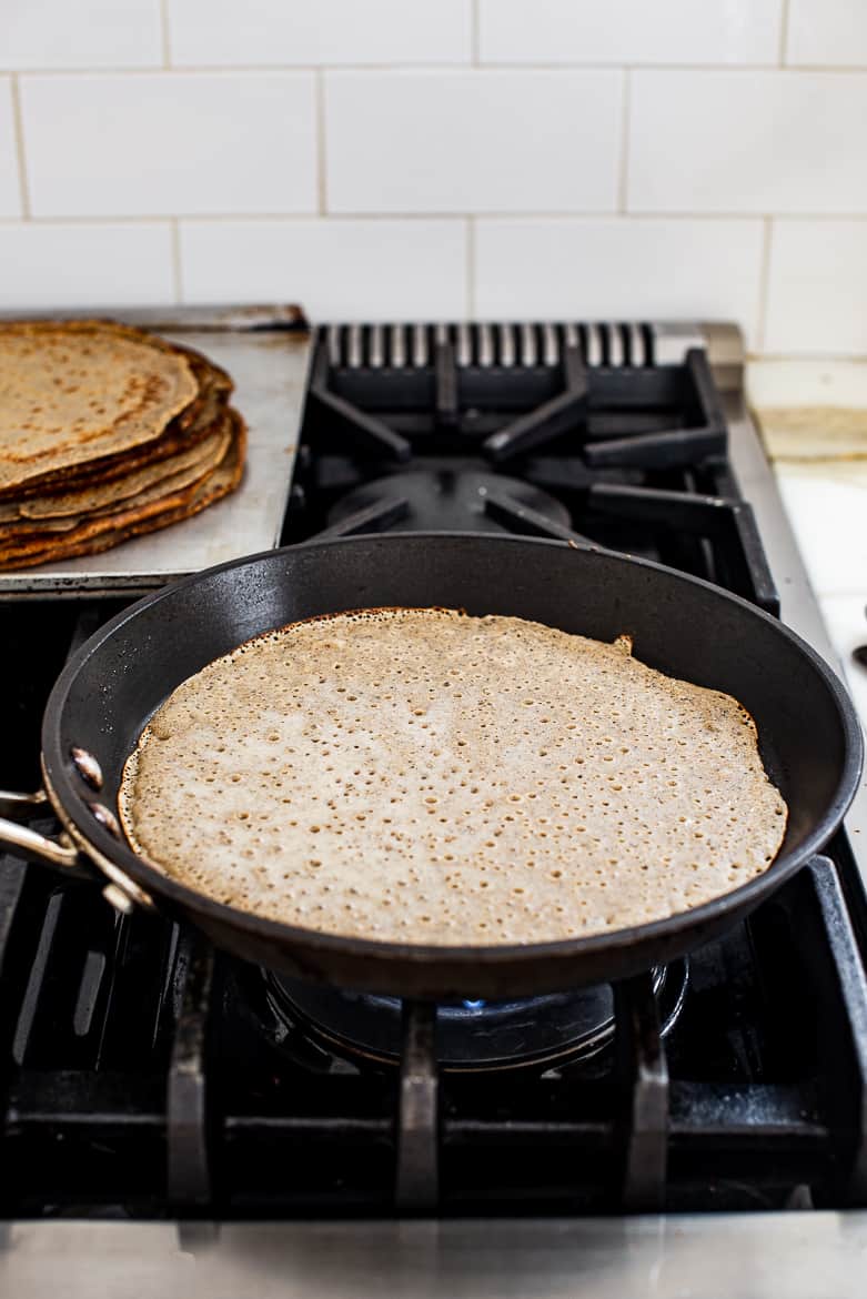 crepe batter in skillet