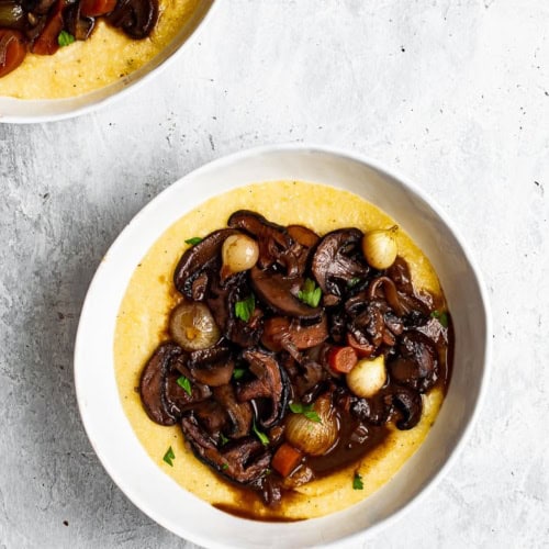 Mushroom Bourguignon served over creamy polenta