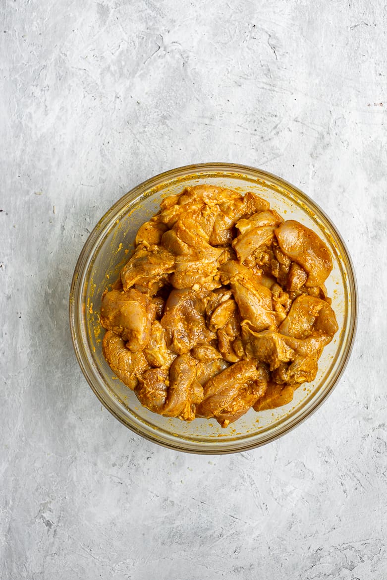 Chicken marinating with shawarma spice-mix