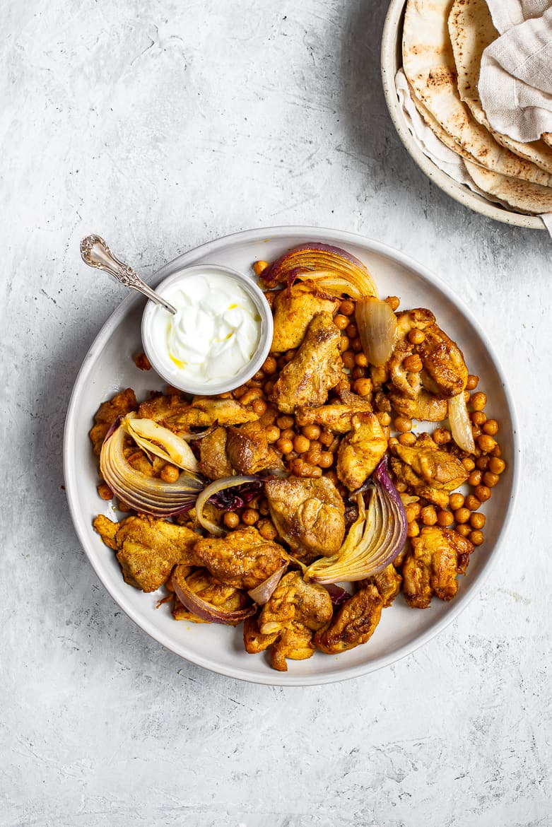 Shawarma chicken and chickpeas on plate