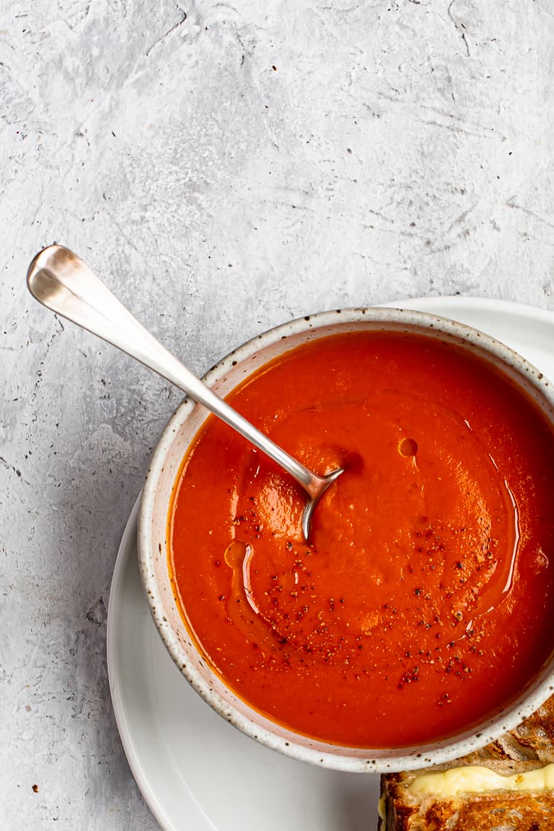 Close up of Tomato soup with grilled cheese sandwich