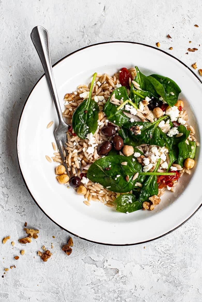 Orzo salad served in small bowl