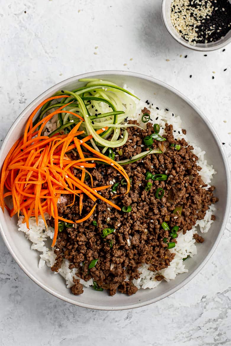 Quick Asian flavoured beef with rice with quick pickled carrots and cucumbers