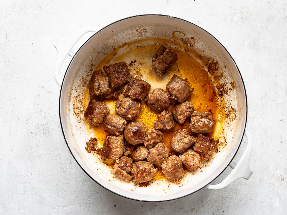 Browning chorizo in Dutch oven