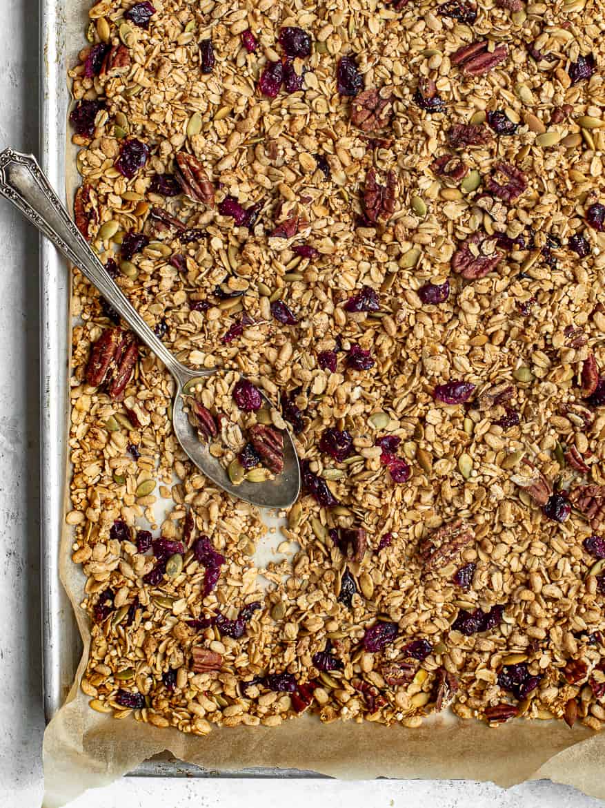 Homemade maple-pecan granola on baking sheet