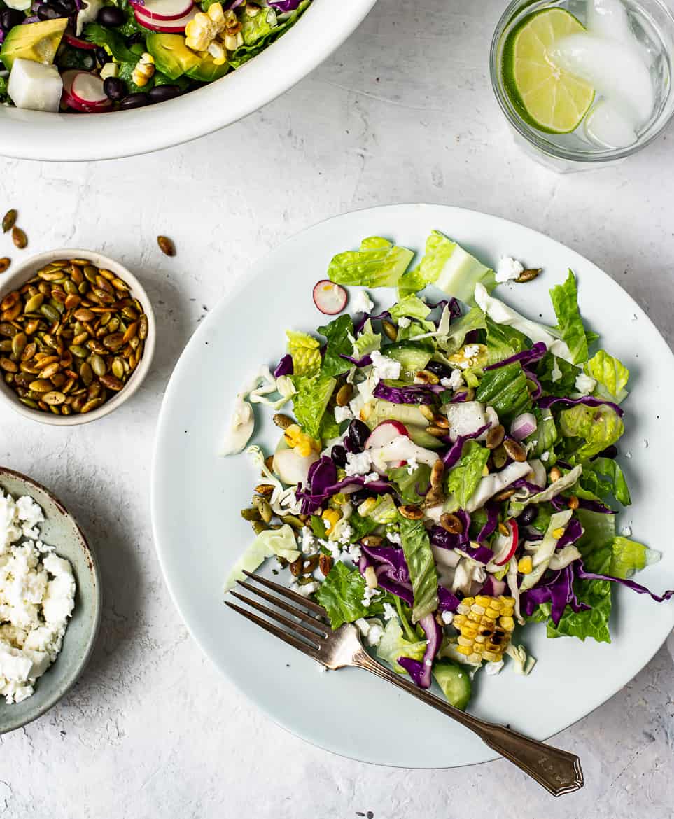 Mexican chopped salad with chipotle pepitas served on plate