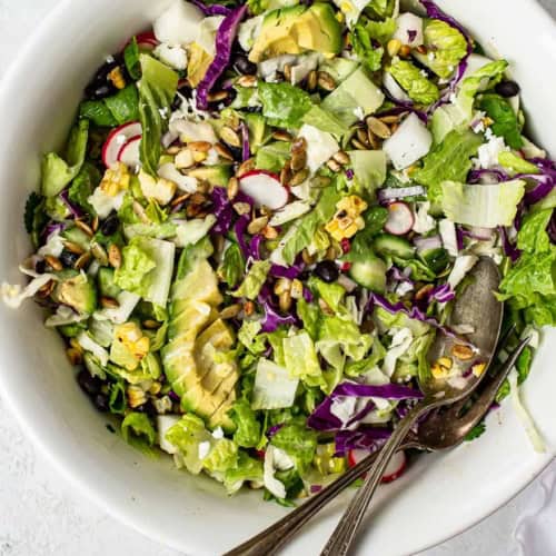 Close up of Mexican chopped salad with chipotle pepitas in bowl