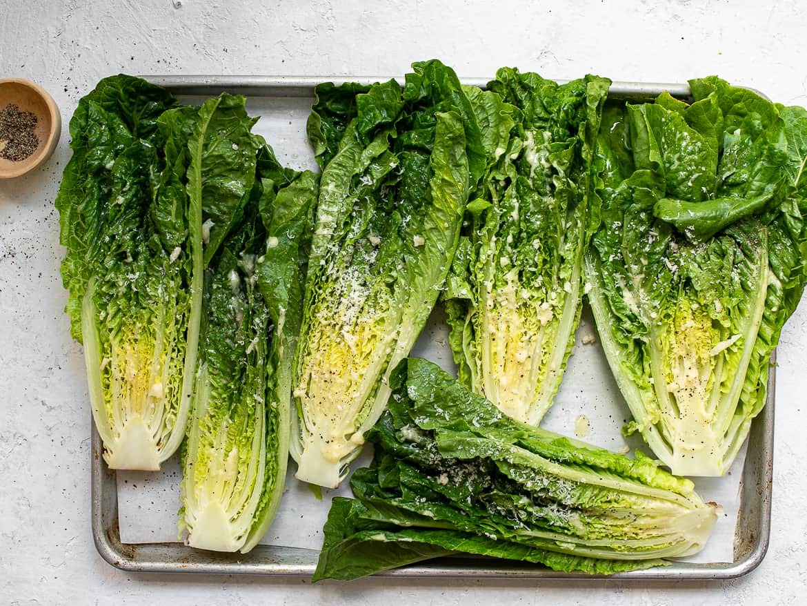 Romaine hearts on tray ready for grilling