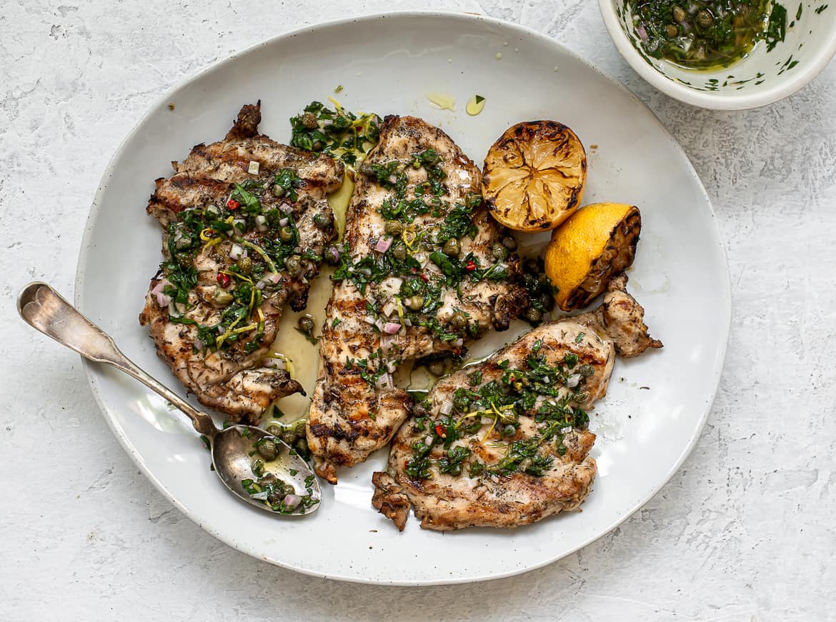 Perfectly grilled juicy chicken breast with Italian Salsa verde