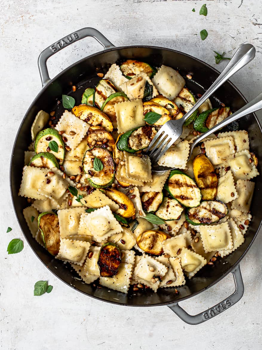 Ravioli Pasta with zucchini and summer squash in pan