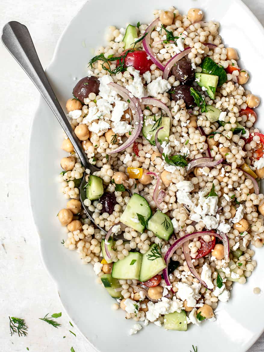 Mediterranean couscous salad on platter