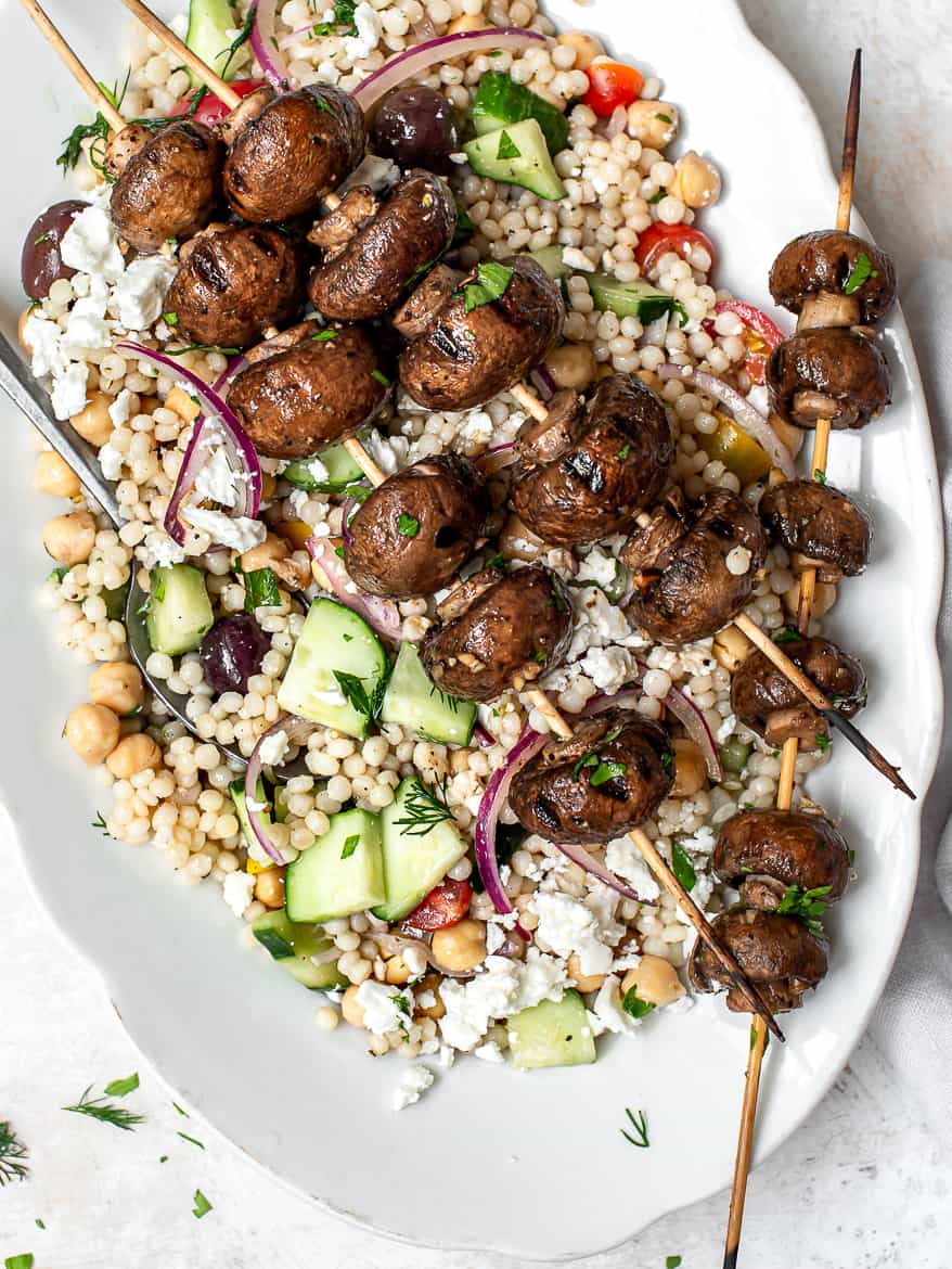 Close up of Grilled mushrooms with Mediterranean Couscous Salad