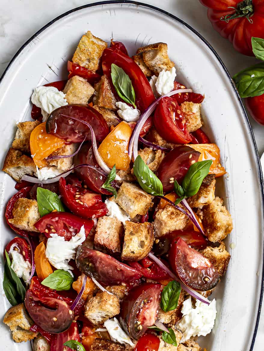 Close up of Summer Tomato Panzanella Salad on platter