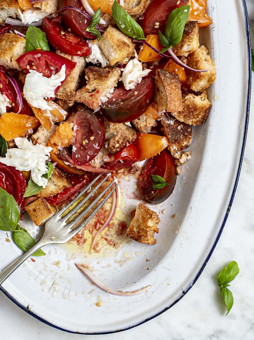 Close up of Summer Tomato Panzanella Salad on platter