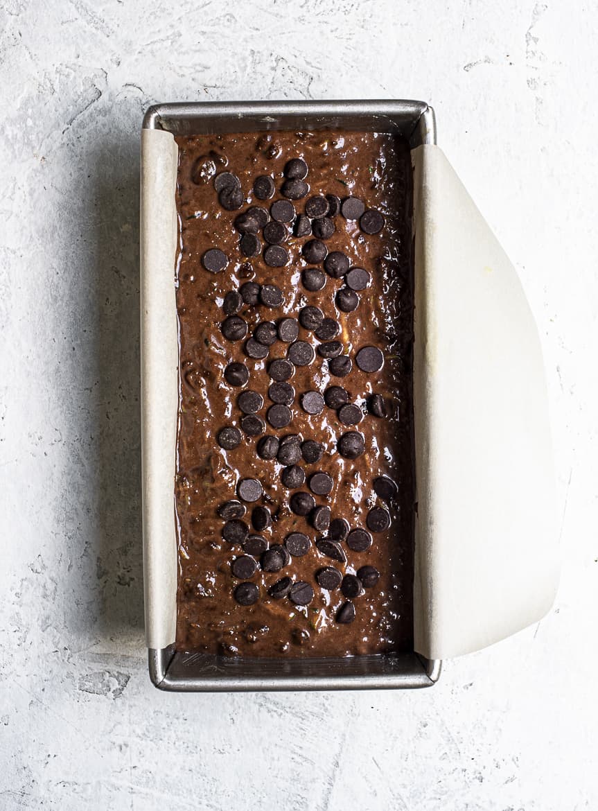chocolate zucchini bread in loaf pan ready to bake