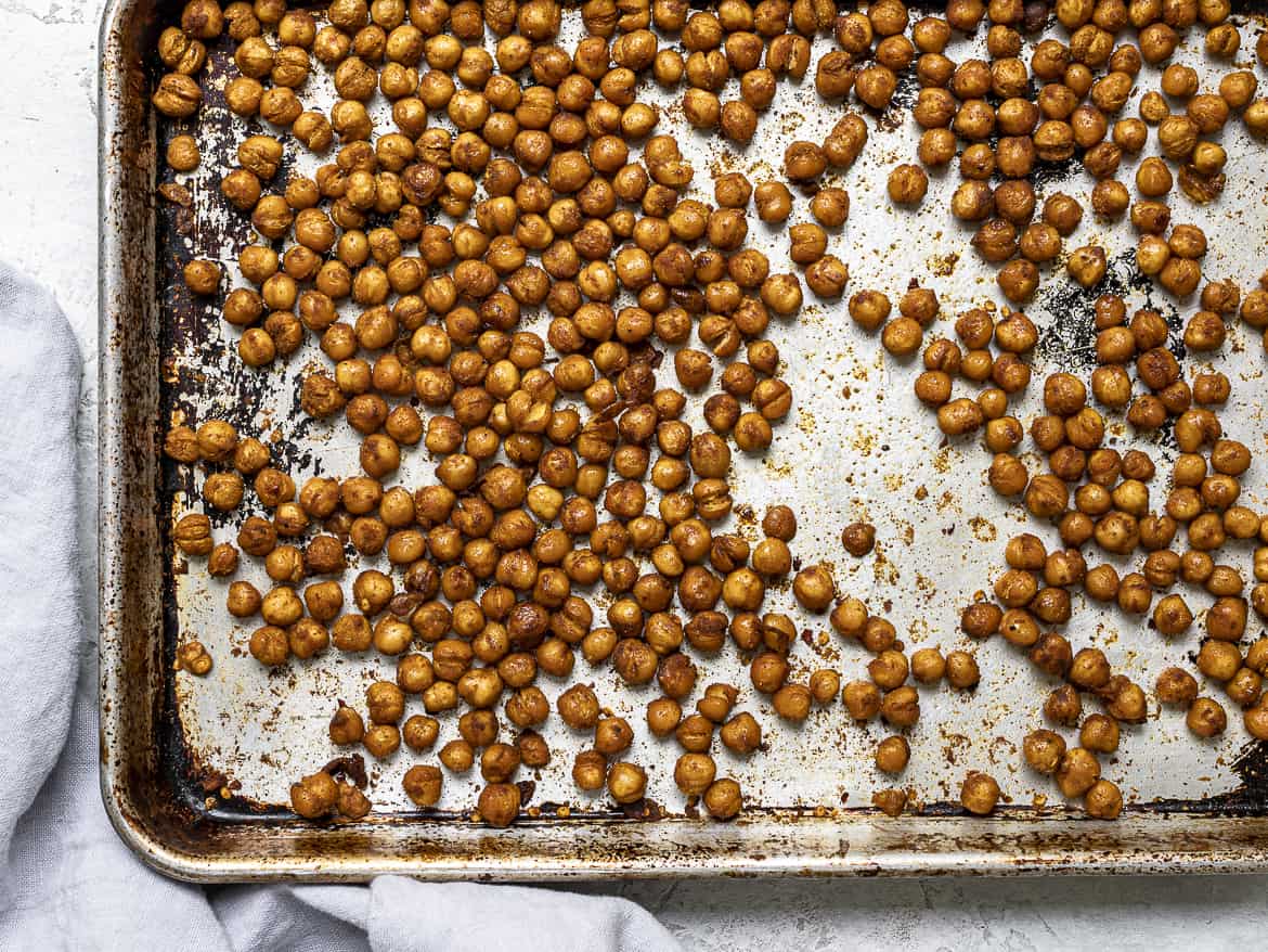 Roasted crispy chickpeas on baking sheet