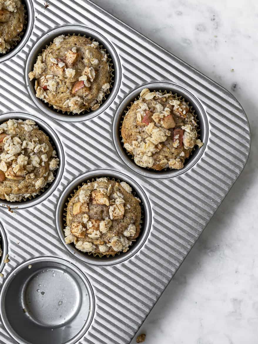 Baked Apple muffins in muffin tin 