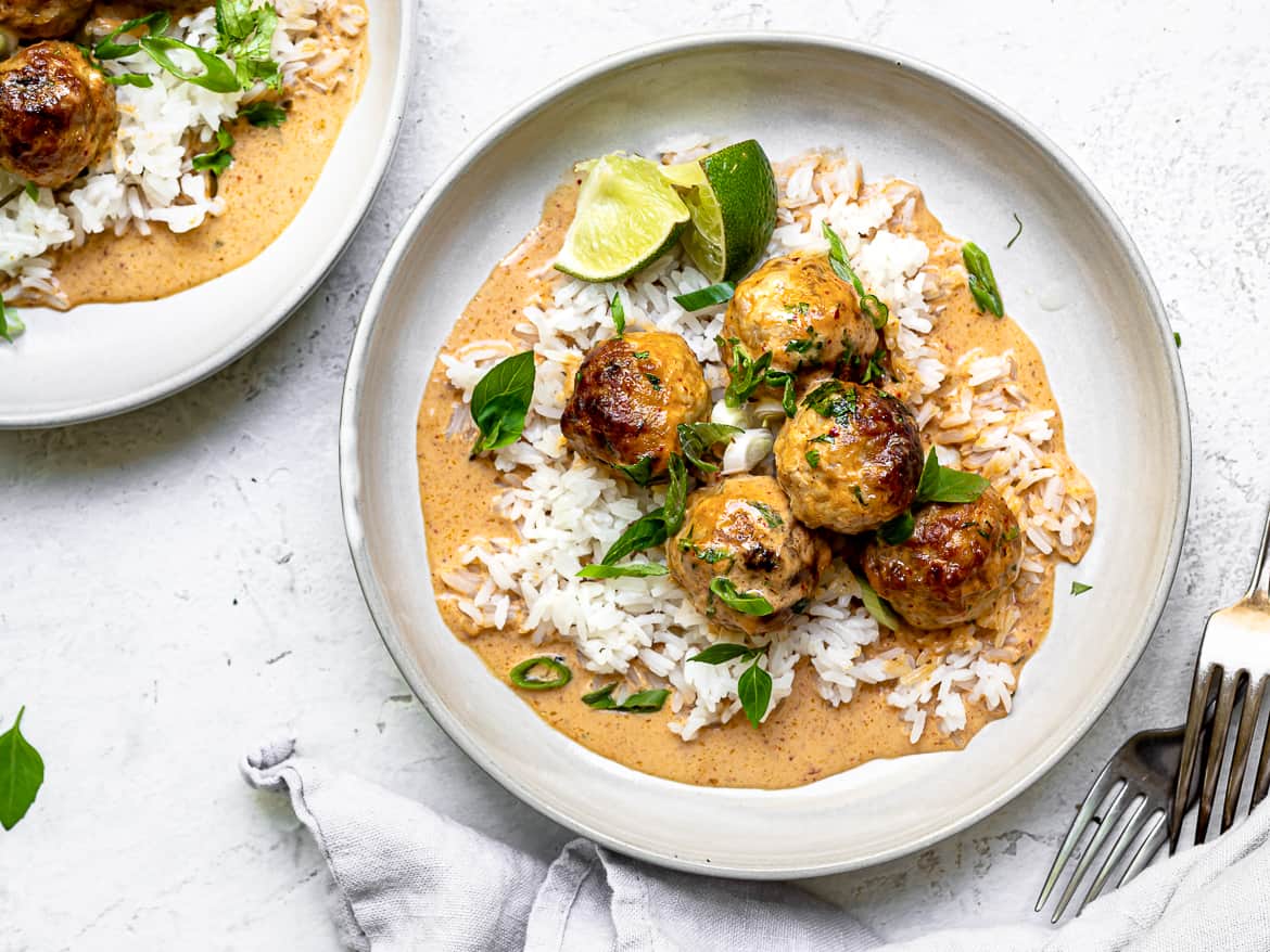 Chicken Meatballs in Thai curry sauce served on plate