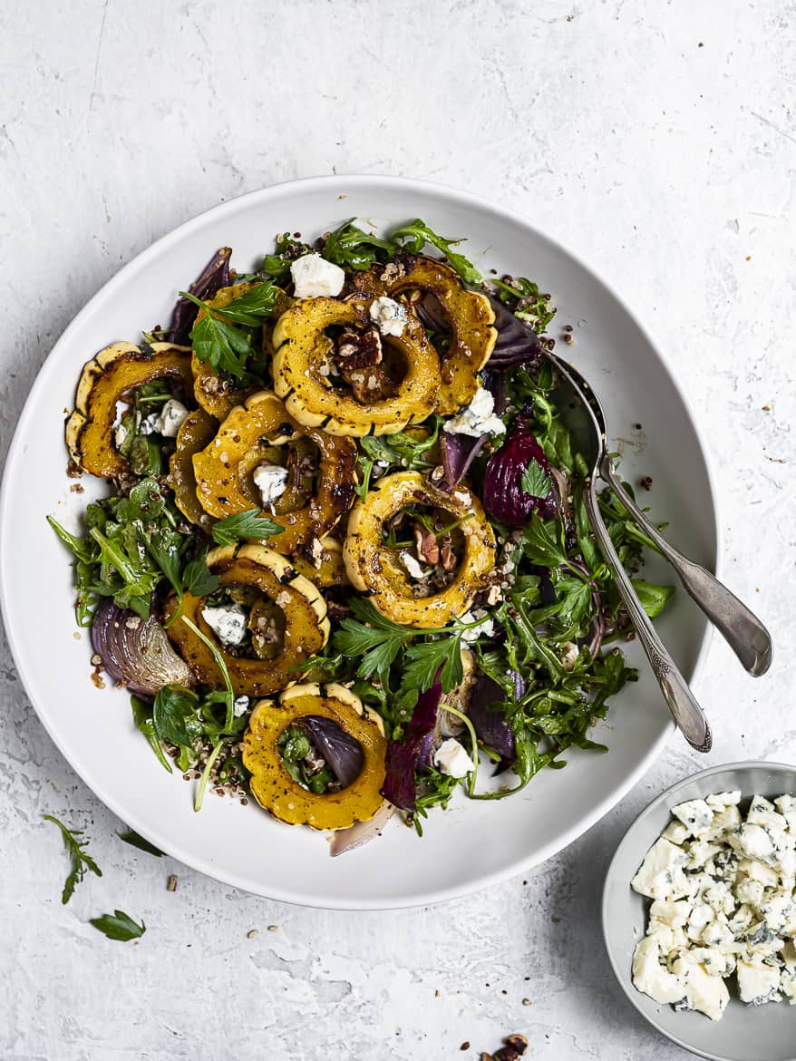 delicata squash and quinoa with greens in bowl 