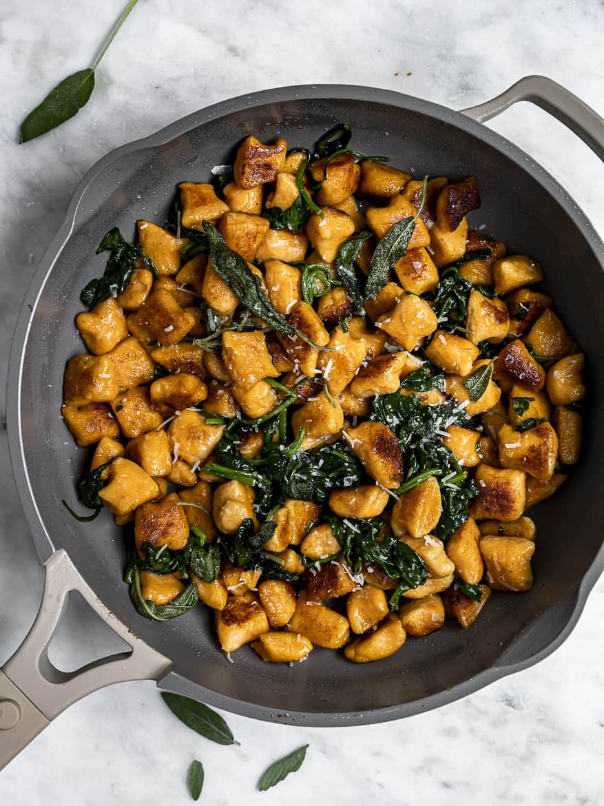 Close up Sweet potato gnocchi with browned butter and sage in pan